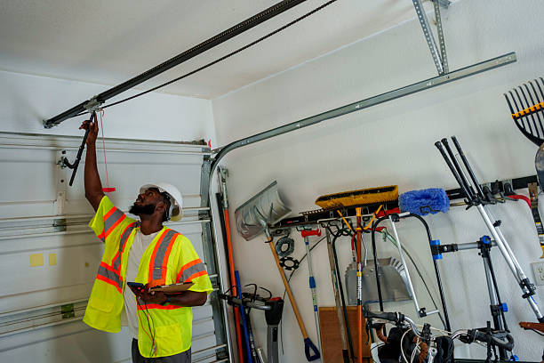 Professional Garage Door Panel Replacement technician working in Williamsville, NY
